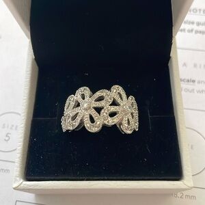 Lia Sophia crystal flower ring size 8. Silver filigree design.